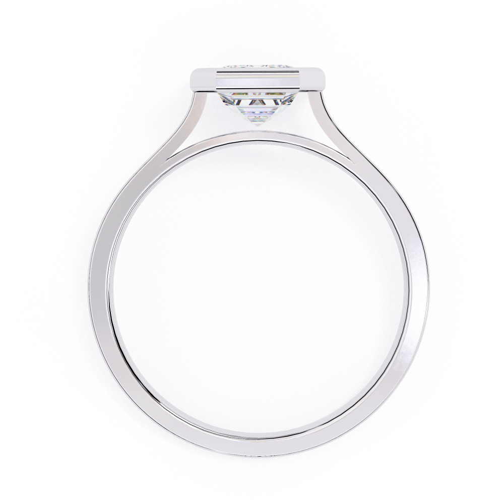 Silver ring with a clear gemstone on a white background