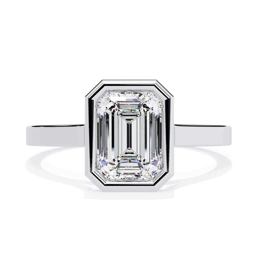 Diamond ring with emerald-cut gemstone on a white background