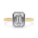 Diamond ring with yellow gold band on a white background