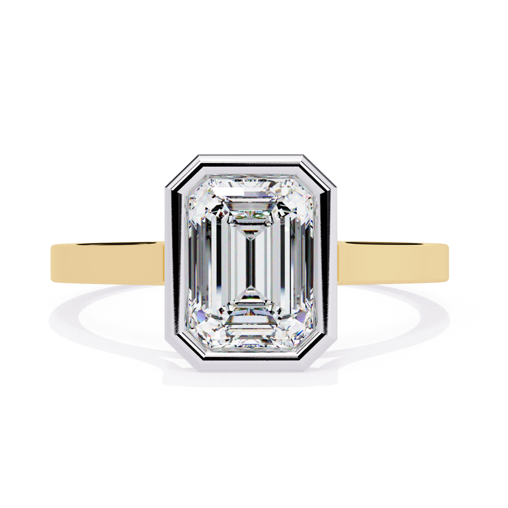 Diamond ring with yellow gold band on a white background