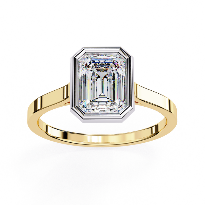Gold ring with a large diamond on a white background