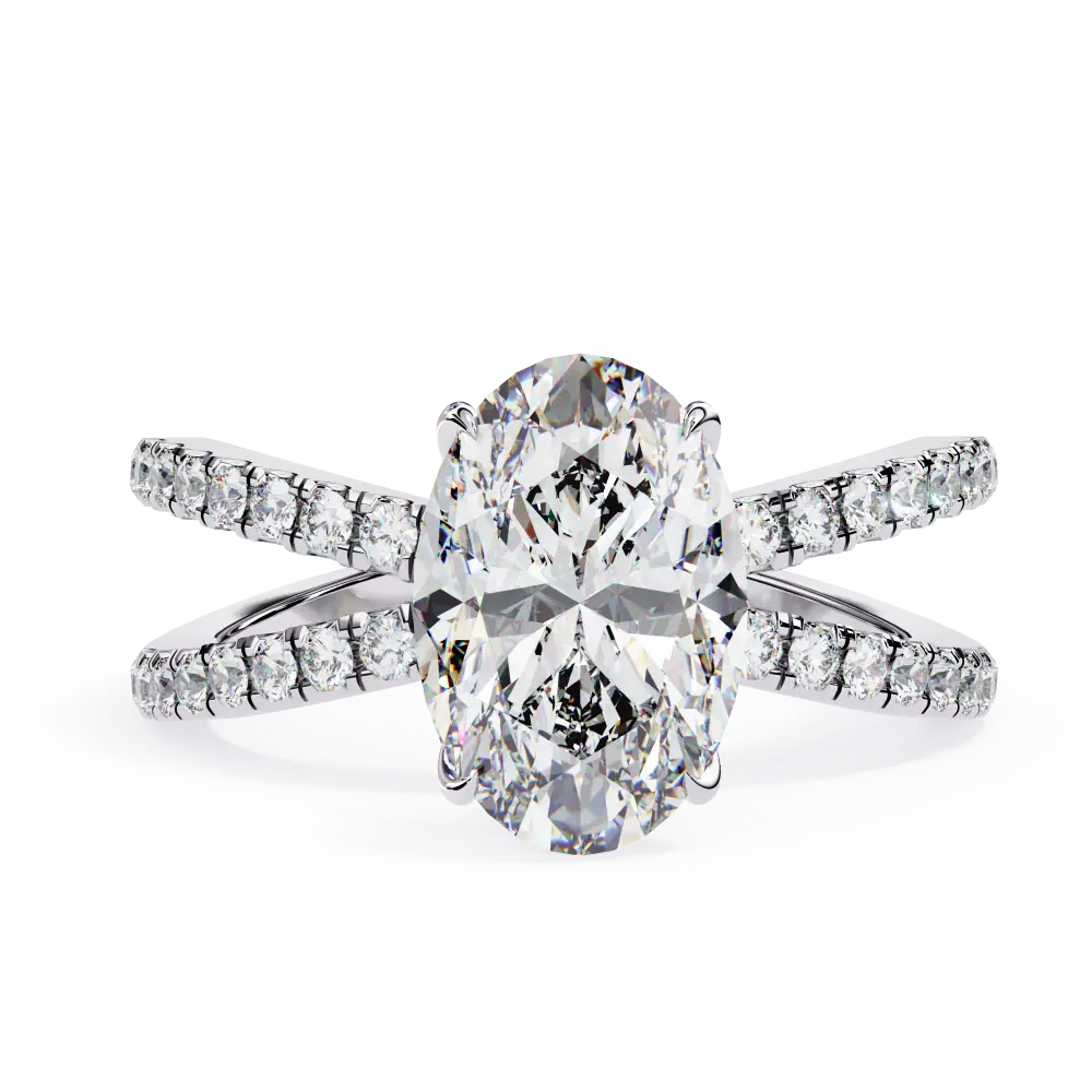 Diamond ring with a large central gemstone and smaller stones on the band against a white background