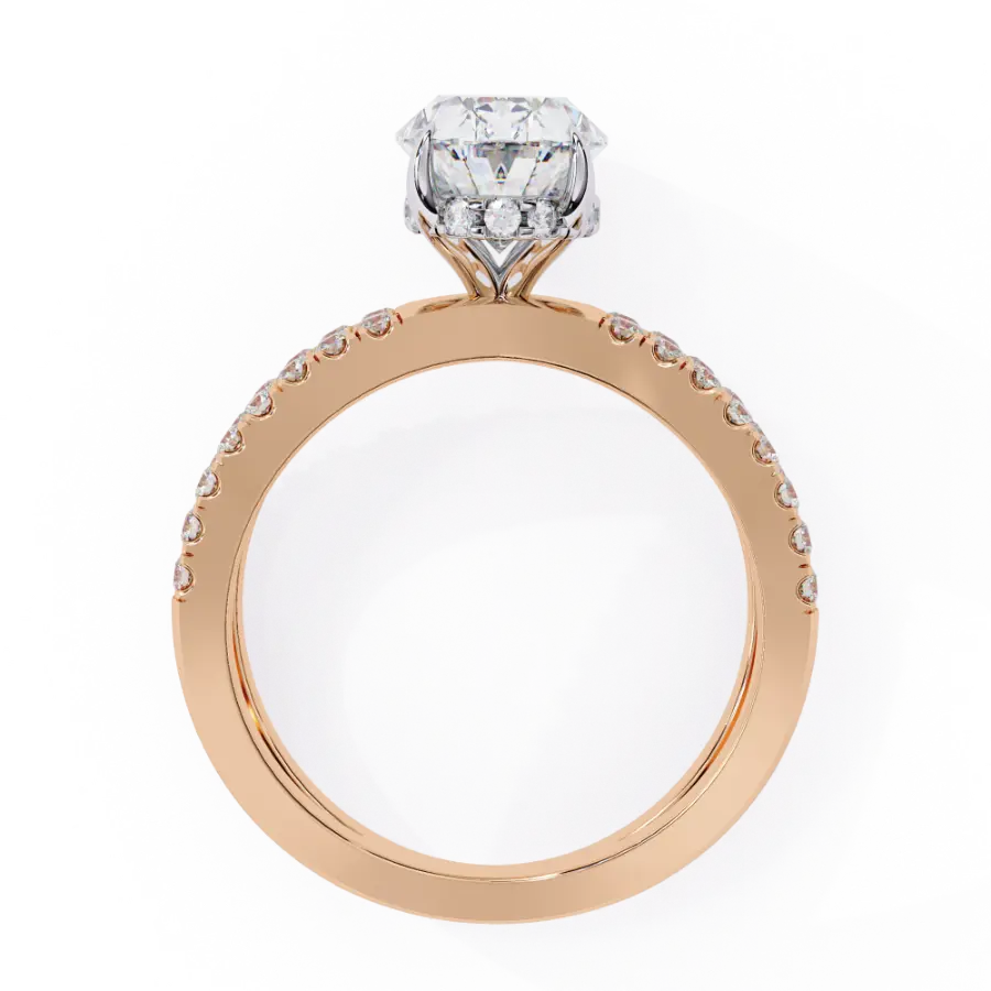 Rose gold ring with a diamond on a white background