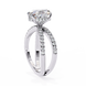 Diamond ring with a white gold band on a white background