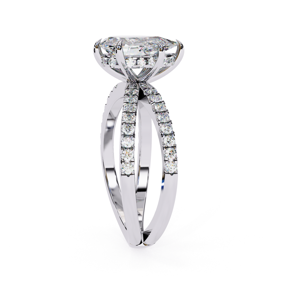 Diamond ring with a large central stone and smaller stones on the band against a white background