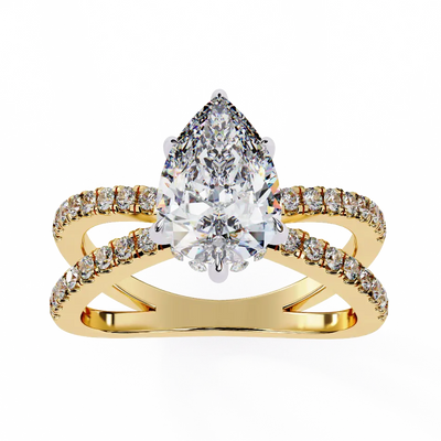 Gold ring with a pear-shaped diamond and smaller diamonds on a white background