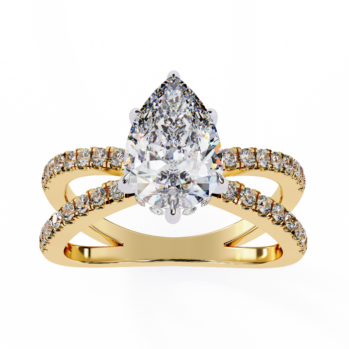 Gold ring with a pear-shaped diamond and smaller diamonds on a white background