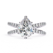 Diamond ring with a pear-shaped center stone on a white background