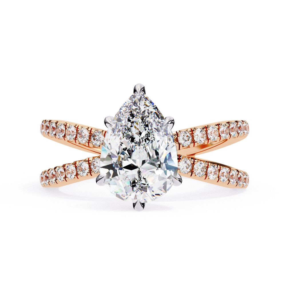 Rose gold ring with a pear-shaped diamond on a white background
