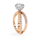 Rose gold ring with a large diamond and smaller diamonds on a white background