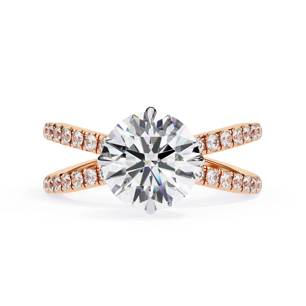 Gold ring with a large diamond and smaller diamonds on the band against a white background