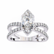 Diamond ring with a marquise-shaped center stone on a white background