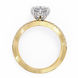 Gold ring with a diamond on a white background