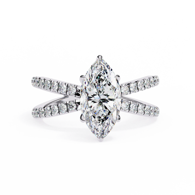 Diamond ring with a pear-shaped center stone on a white background