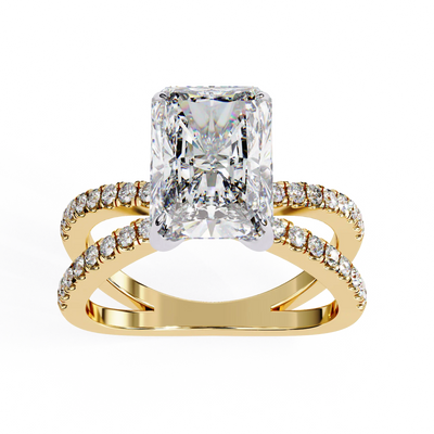 Gold ring with a large diamond and smaller diamonds on the band against a white background