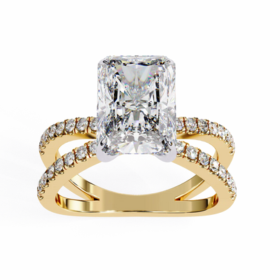 Gold ring with a large diamond and smaller diamonds on the band against a white background
