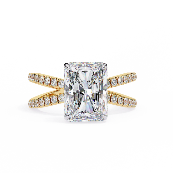 Gold ring with a large diamond and smaller diamonds on the band against a white background