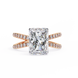 Rose gold ring with a large diamond and smaller diamonds on the band against a white background