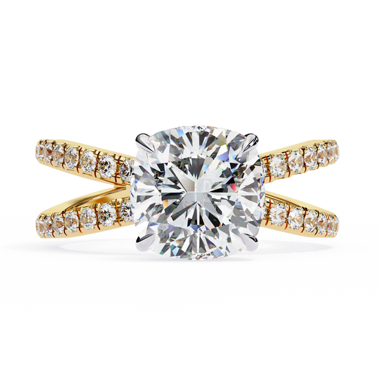 Gold ring with a large diamond and smaller diamonds on the band against a white background