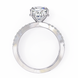 Silver ring with a heart-shaped diamond on a white background