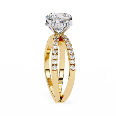 Gold ring with a large diamond and smaller diamonds on the band against a white background