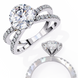 Two silver rings with diamond-like stones on a white background