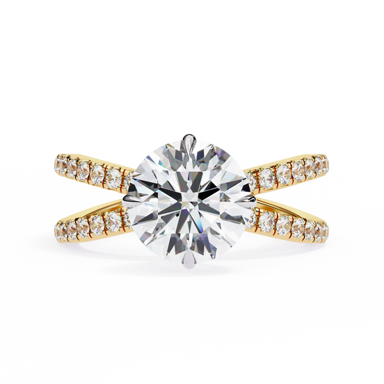 Gold ring with a large diamond and smaller diamonds on the band against a white background