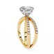 Gold ring with a diamond on a white background