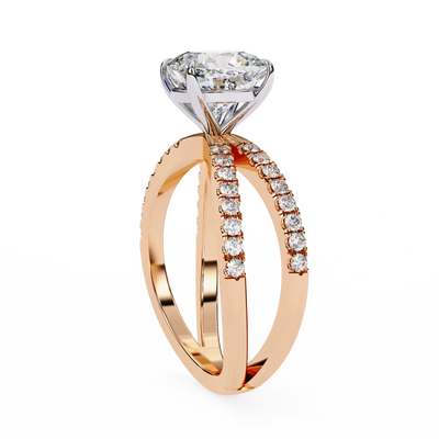 Rose gold ring with a large diamond and smaller diamonds on the band against a white background