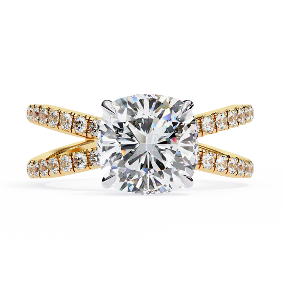 Gold ring with a large diamond and smaller diamonds on the band against a white background