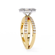Gold ring with a diamond on a white background
