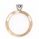 Gold ring with a diamond on a white background