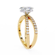 Gold ring with a diamond on a white background
