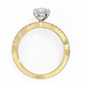 Gold ring with a diamond on a white background