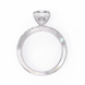 Silver ring with a large central diamond and smaller diamonds on the band against a white background