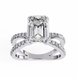 Diamond ring with a rectangular center stone on a white background
