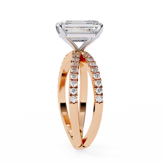 Rose gold ring with diamond accents on a white background