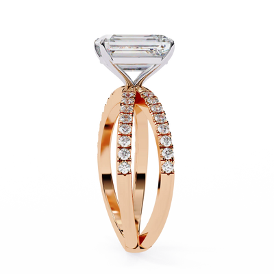 Rose gold ring with diamond accents on a white background