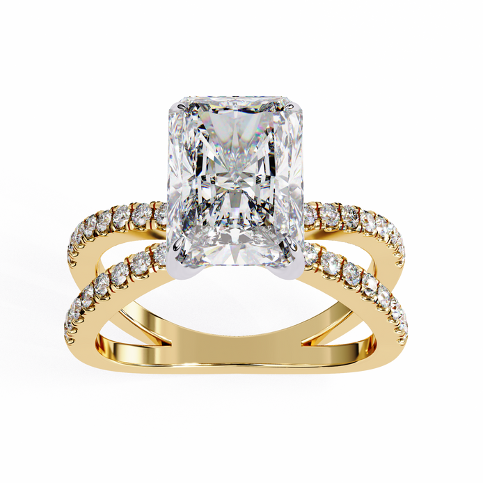 Gold ring with a large diamond and smaller diamonds on the band against a white background
