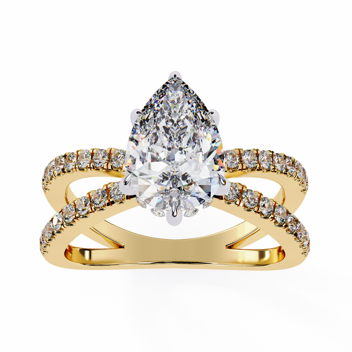 Gold ring with a pear-shaped diamond and smaller diamonds on a white background