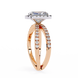 Rose gold ring with diamond accents on a white background