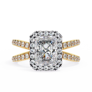 Diamond ring with gold band on a white background