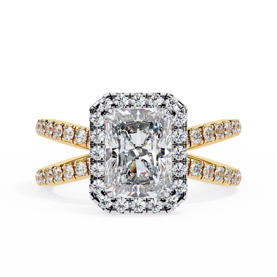 Diamond ring with gold band on a white background