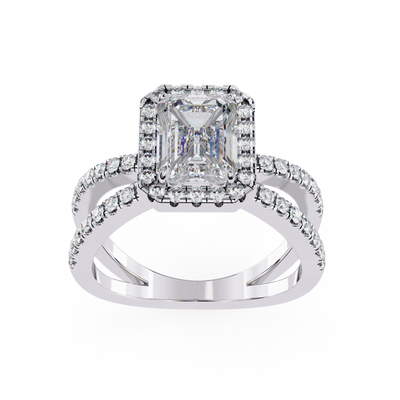Diamond ring with a central emerald-cut diamond and smaller diamonds on a white background