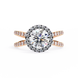 Diamond ring with rose gold band on a white background