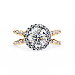 Diamond ring with gold band on a white background