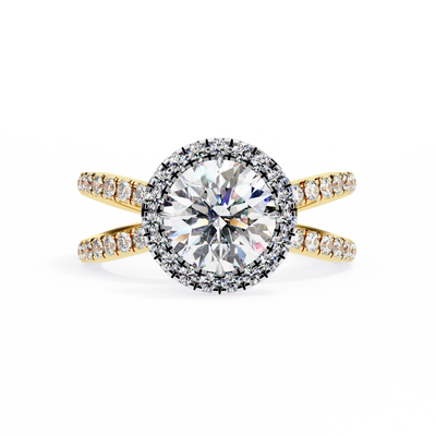 Diamond ring with gold band on a white background
