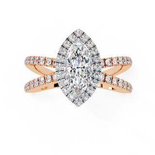 Rose gold ring with a large diamond and smaller diamonds on the band against a white background