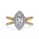 Gold and diamond ring on a white background