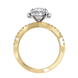 Gold ring with diamond accents on a white background